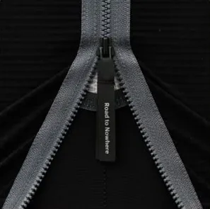 Two-way zipper pull detail