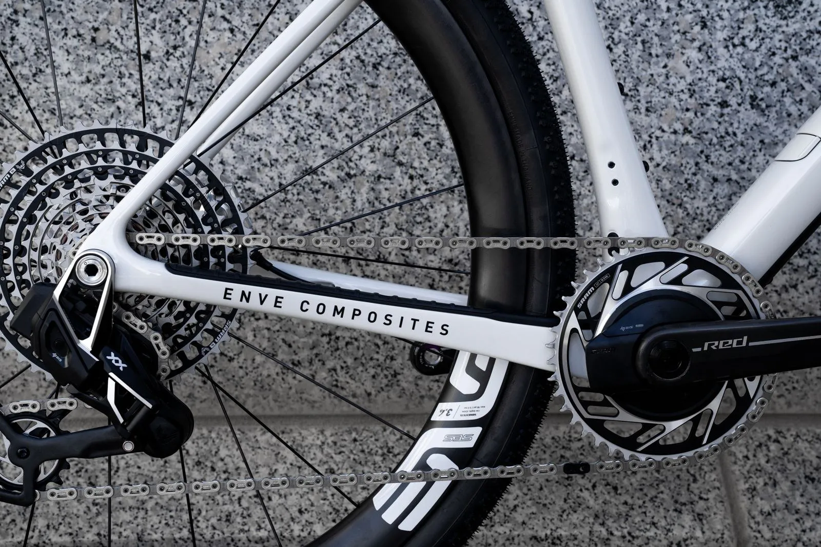 SRAM XX rear derailleur, cassette and Red crankset on a white ENVE frame