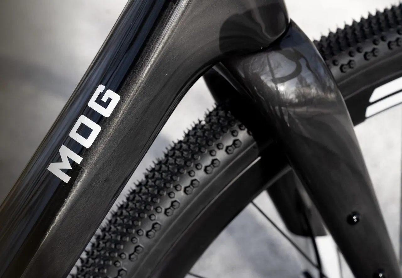 Close-up of the carbon fork and MOG down tube lettering on an ENVE MOG gravel bike